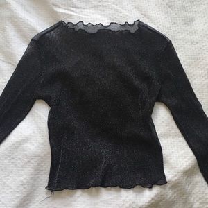 Sheer sparkly mesh top.